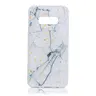 Samsung Galaxy S10e - Marmo bianco e scaglie d'oro